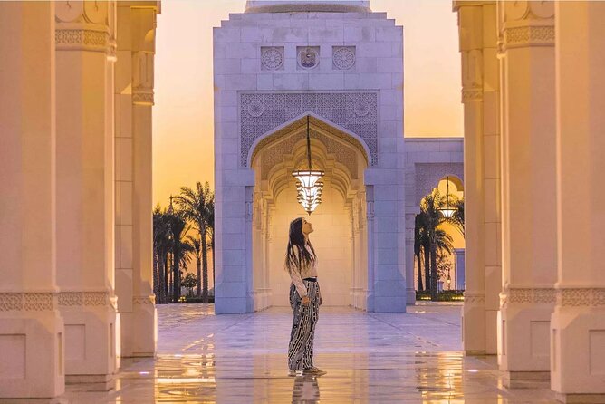 Abu Dhabi City Tour: Grand Mosque, Palace, Souk, Louvre & Ferrari - Dates Market and Heritage Village