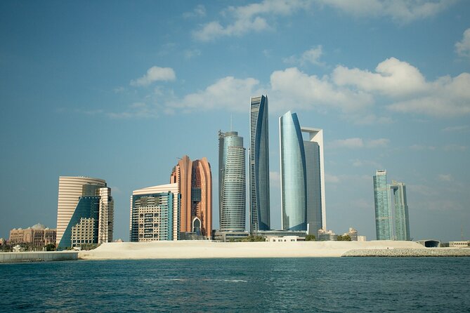 Abu Dhabi City Tour With Presidential Palace Entrance - Guided Tour - Heritage Village adds a simpler, older-looking contrast