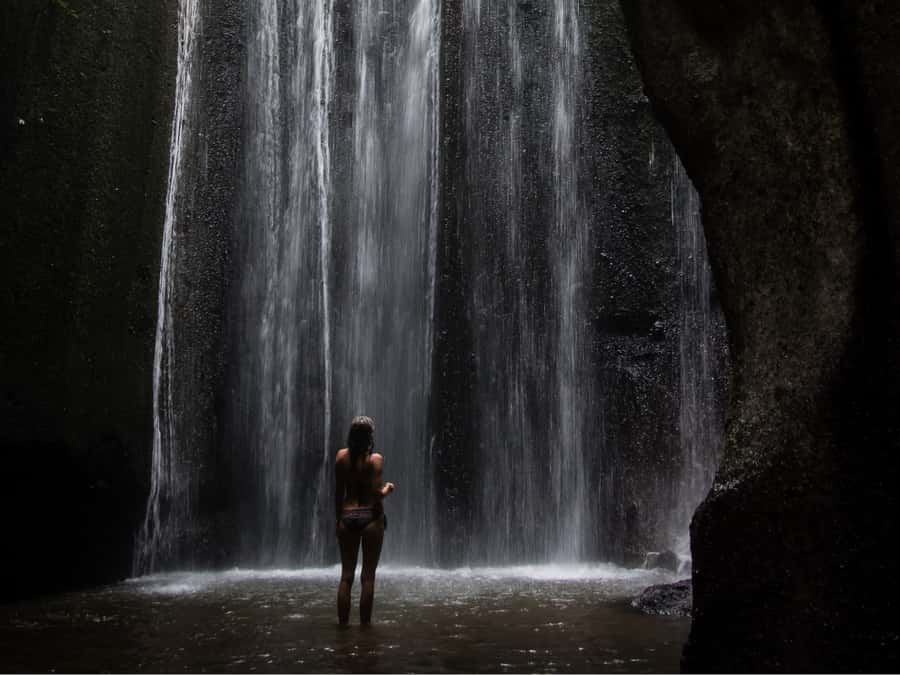 Bali: Lempuyang Quick Access, Waterfall, Water Palace & More - Goa Raja Waterfall: mist, swimming, and uneven footing