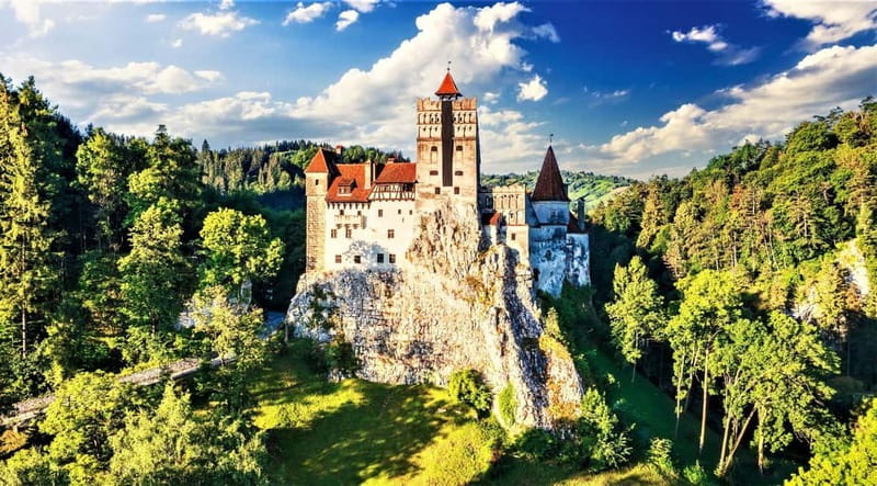 Bucharest: Peles and Bran Castles and Brasov Day Trip - Peleș Castle: royal rooms in the Carpathian foothills