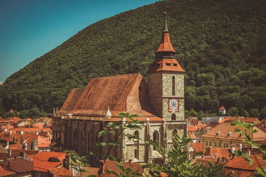 Bucharest: Peles Castle, Bran Castle & Brașov Day Tour - Brașov, from Gothic stone to open squares