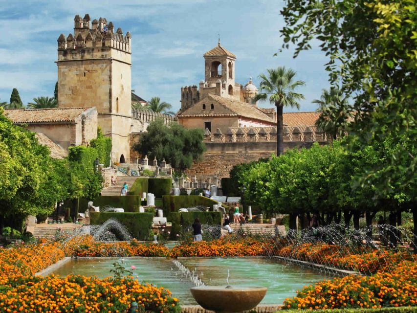 Cordoba: Alcazar of The Christian Monarchs Tickets and Tour - Meeting the guide at the red umbrella