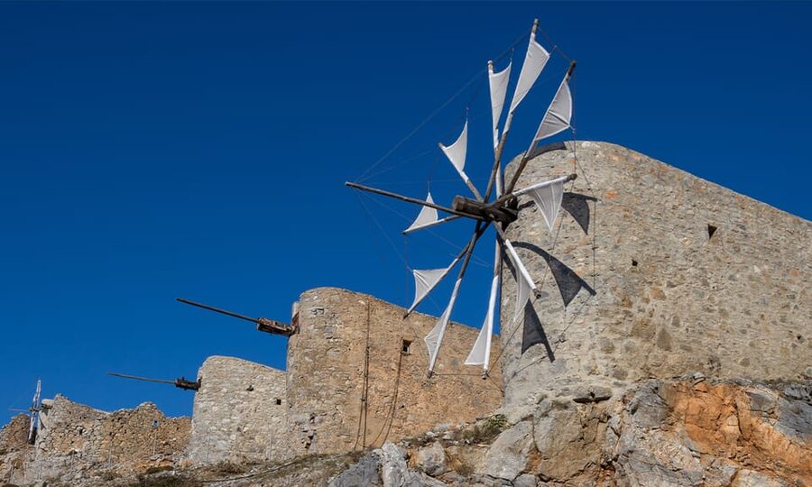 Crete: Lasithi Plateau & Knossos Palace Day Trip - Climbing toward Lasithi Plateau