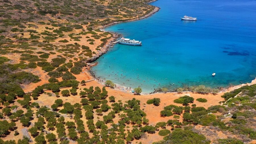 Crete: Mirabello Bay Cruise with Onboard Cocktail - Guides, languages, and the tone of the day