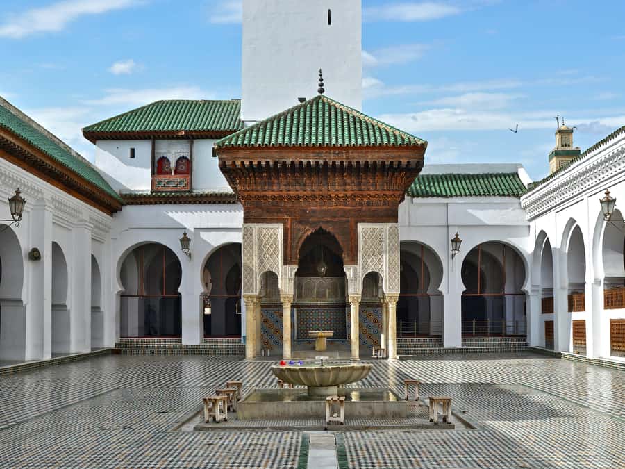 Fes: Royal Palace, Madrasa, Tannery & Souks and Medina Tour - Bou Inania and Al Attarine: patterned ceilings and quiet courtyards