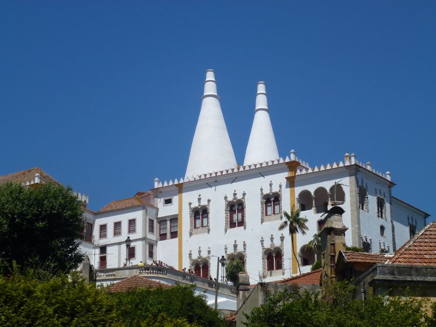 From Lisbon: Sintra Pena Palace Cascais 8-People Group Tour - Pena Palace and Park: the grand finale