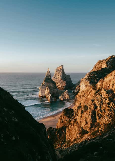 From Lisbon: Sintra, Pena Palace, Regaleira, Roca & Cascais - Guincho Beach and Boca do Inferno add two coastal moods