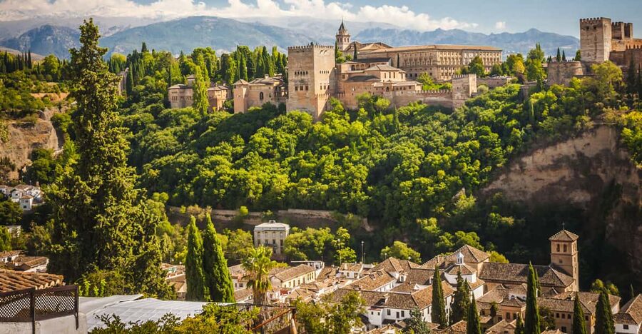 From Malaga: Day Trip to Alhambra by Bus with Entry Tickets - The Alhambra entrance and Granada views