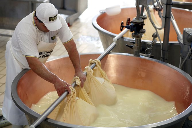 From Parma: Parmigiano Reggiano Farm Tour & Tasting with Transfer - From Parma station to the dairy countryside