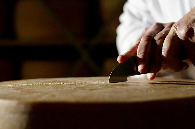 From Parma: Parmigiano Reggiano Farm Tour & Tasting with Transfer - The salt, molds, and long rows of aging wheels