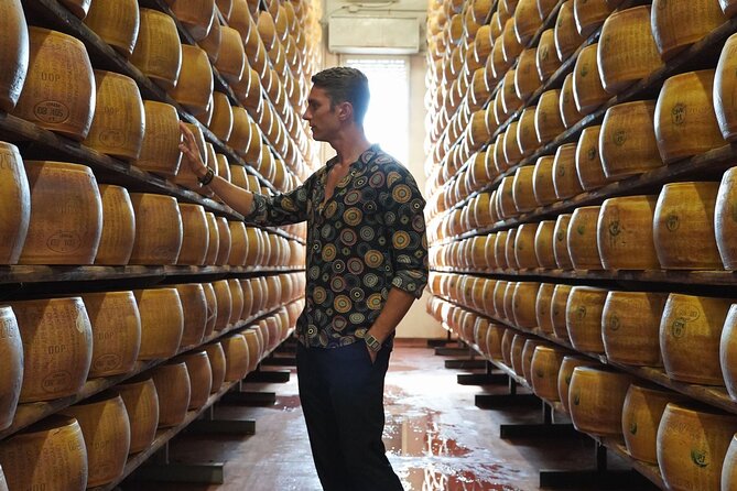 From Parma: Parmigiano Reggiano Farm Tour & Tasting with Transfer - Inside the caseificio: seeing the cheese take shape