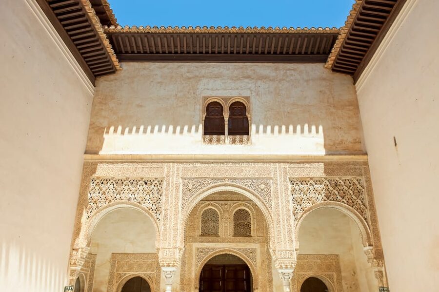 Granada: Alhambra and Albaicín Small Group Tour - Charles V Palace, a sharp change in style