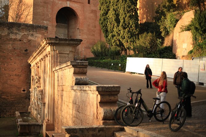 Granada: Alhambra and Sierra Nevada Sunset Views by E-Bike - The guide makes the history useful