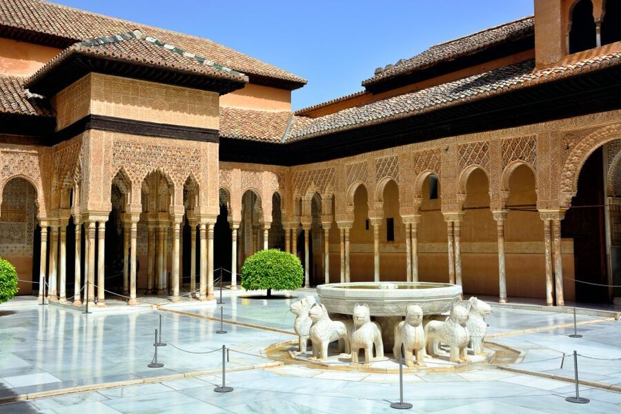Granada: Alhambra Full Complex & Andalusi Monuments Tickets - Entering the Alhambra complex