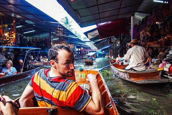 Grand Palace, Damnoen Floating Market & Maeklong Railway Market Tour – Full Day - Maeklong Railway Market and the umbrella-pulldown spectacle