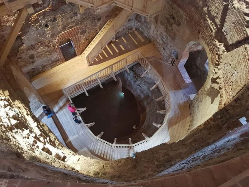 Latvian Palace and Medieval Castle Private Trip - Bauska Castle gives the day an older, rougher edge