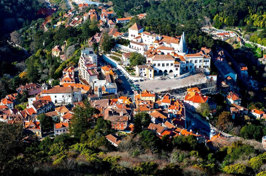 Lisbon: Pena Palace, Qta Regaleira, Moorish Castle & Cascais - Quinta da Regaleira: tunnels, symbols, and steep garden paths