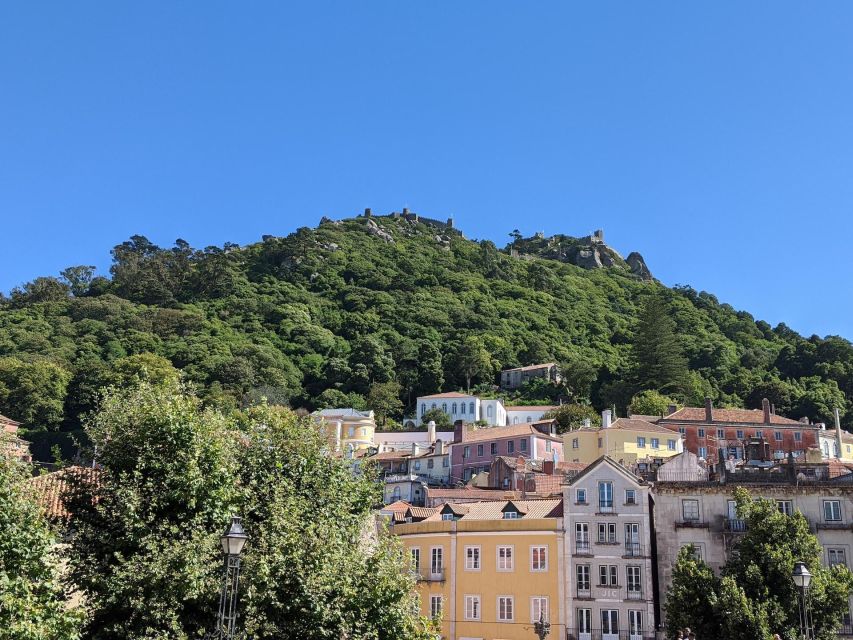 Lisbon: Sintra, Pena Palace, Cabo Roca Coast & Cascais Tour - Leaving Lisbon in an air-conditioned van