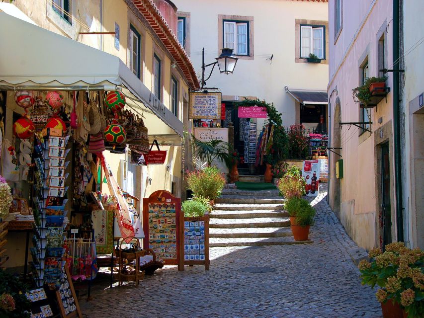 Lisbon: Sintra, Pena Palace, Quinta Regaleira, Cascais Tour - Quinta da Regaleira, symbols and maze-like paths