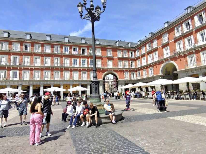 Madrid Private tour: Royal Palace & Cathedral & Old city - Reading Almudena Cathedral beside the palace