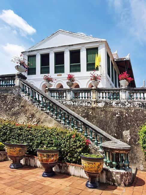 Petchaburi Temples & Royal Palace - small Join Group Tour - Reading the details at Wat Mahathat Worawihan