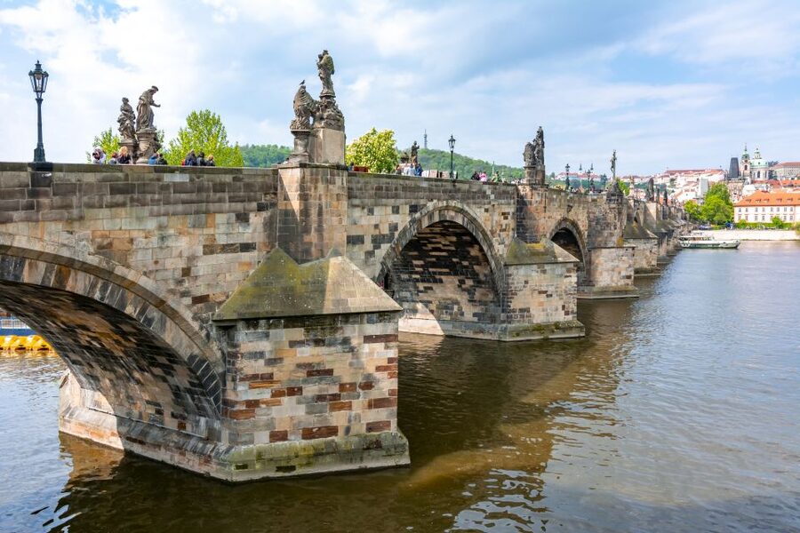Prague: 3-Hour Old Town and Prague Castle Tour in German - Clementinum and the approach to Charles Bridge