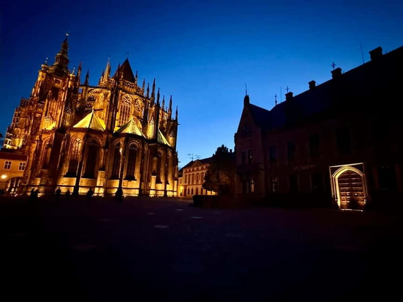 Prague: Night Walk through Prague Castle with City Views - Descending the Old Castle Stairs at 10 p.m.