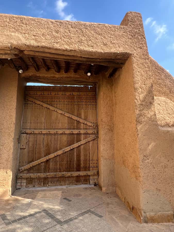Riyadh: Masmak Fort, Souq AlZal, and Murabba Palace Tour - Al Bujairi Heritage Park and the view toward Diriyah