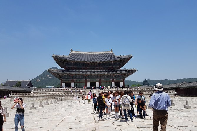 Seoul City Sightseeing Tour Including Gyeongbokgung Palace, N Seoul Tower, and Namsangol Hanok Village - A drive past Cheongwadae and the old royal center