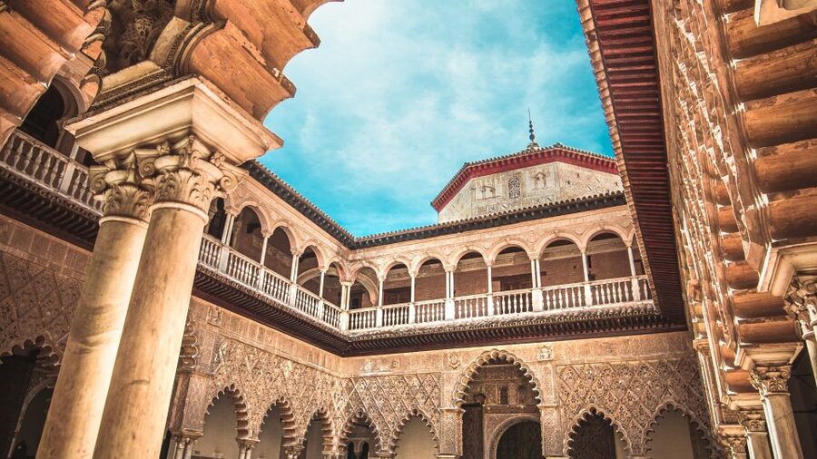 Seville: Alcazar, Cathedral, and Giralda Skip-the-Line Tour - Seville Cathedral: Gothic scale, chapels, and artworks
