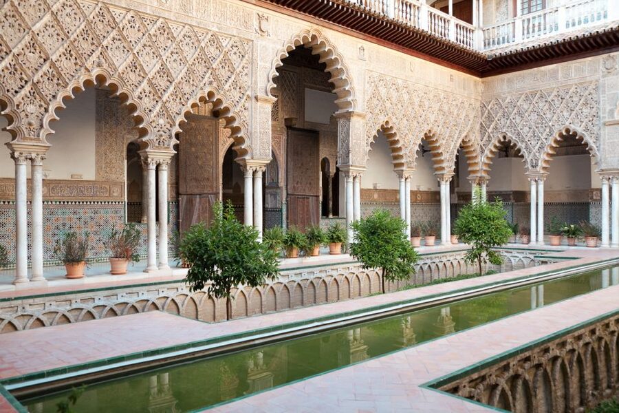 Seville: Alcázar, Cathedral & Giralda Fast Track Guided Tour - The Alcázar: tiled rooms, royal layers, and gardens