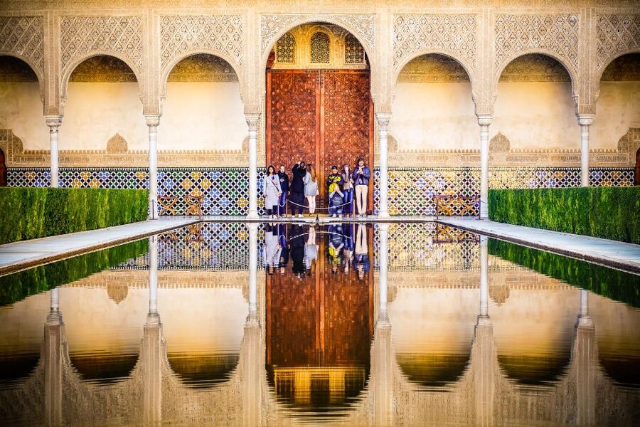 Seville: Alhambra Day Trip with Guide & Nasrid Palaces Entry - Charles V Palace and its artwork