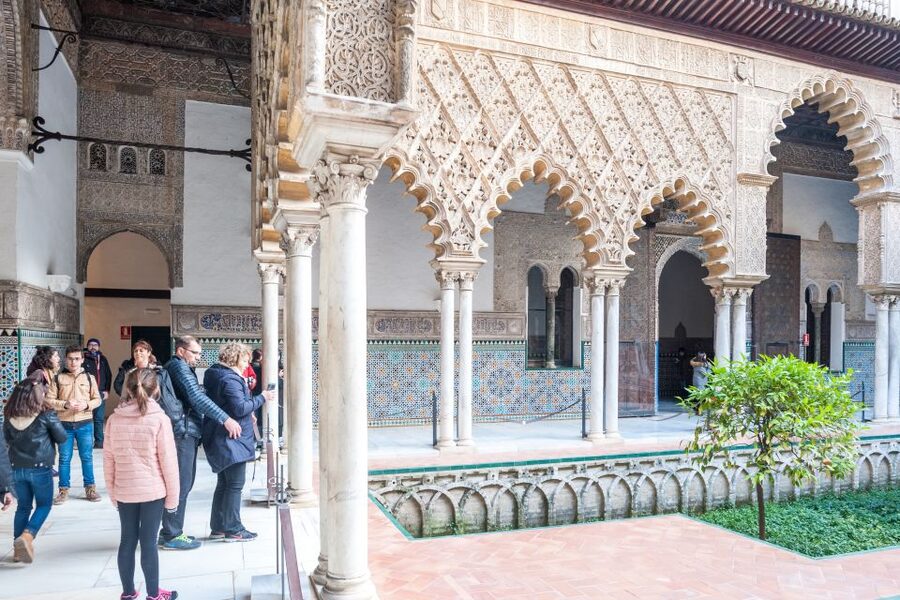 Seville: Cathedral, Giralda & Alcazar Entry With Guided Tour - The Alcazar, from tiled courtyards to orange trees
