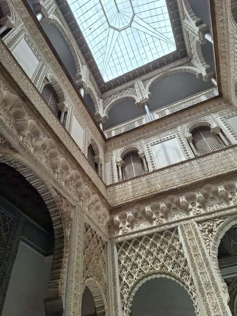 Seville: Guided tour of the Alcazar, Cathedral, and Giralda - Seville Cathedral: scale, art, and Columbus’s tomb