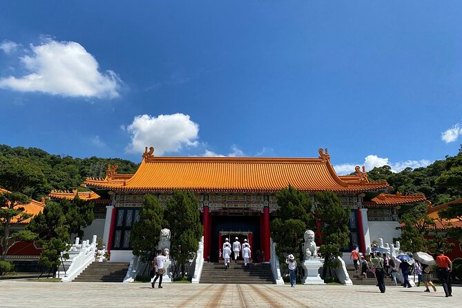 Taipei City Morning Tour with National Palace Museum entry - Longshan Temple: a living place of worship