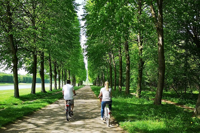 Versailles Bike Tour with Market, Gardens & Guided Palace Tour - Marie-Antoinette’s hamlet away from court life