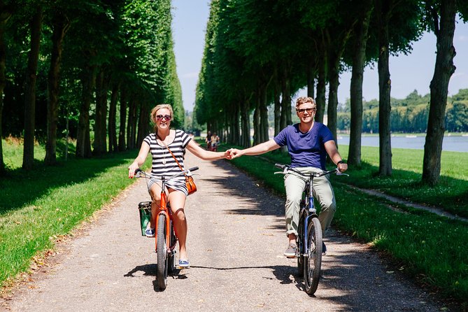 Versailles Full Day Bike Tour with Palace, Gardens, & Picnic - Guides, group size, and the pace of the day