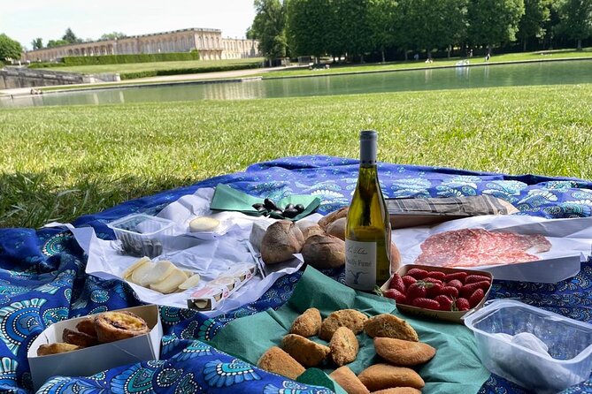 Versailles Full-Day Electric Bike Tour : Market, Picnic & Palace - Walking the formal gardens and entering the palace