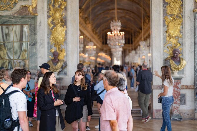 Versailles Palace Full Day or Half Day Tour with Local Guide - Meeting Louis XIV at the palace entrance