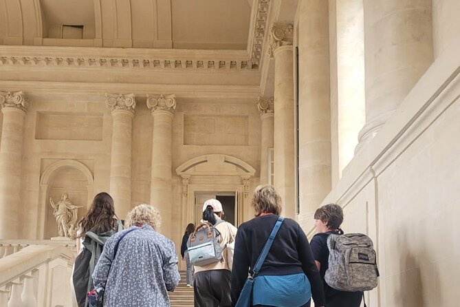 Versailles Palace Guided Tour with Gardens Access - Guides, headsets, and the human side of the tour