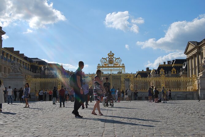 Versailles Small Group Guided Tour with Local Guide - Meeting Louis XIV before entering the palace