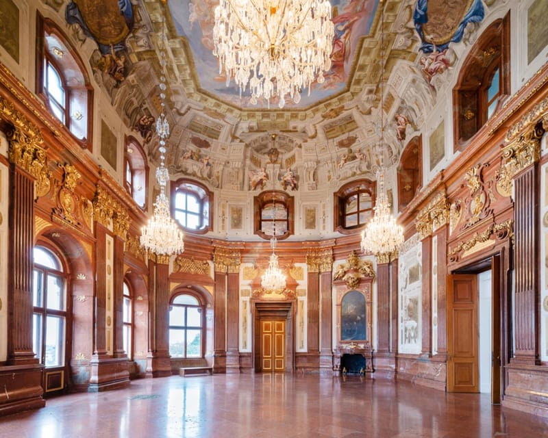 Vienna: Belvedere Palace Skip-the-Line Tour - Meeting the guide at the black gate